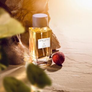 Secret de Feu I in warm sunlight among leaves