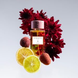 Secret de Feu II with dark red flowers and citrus slices